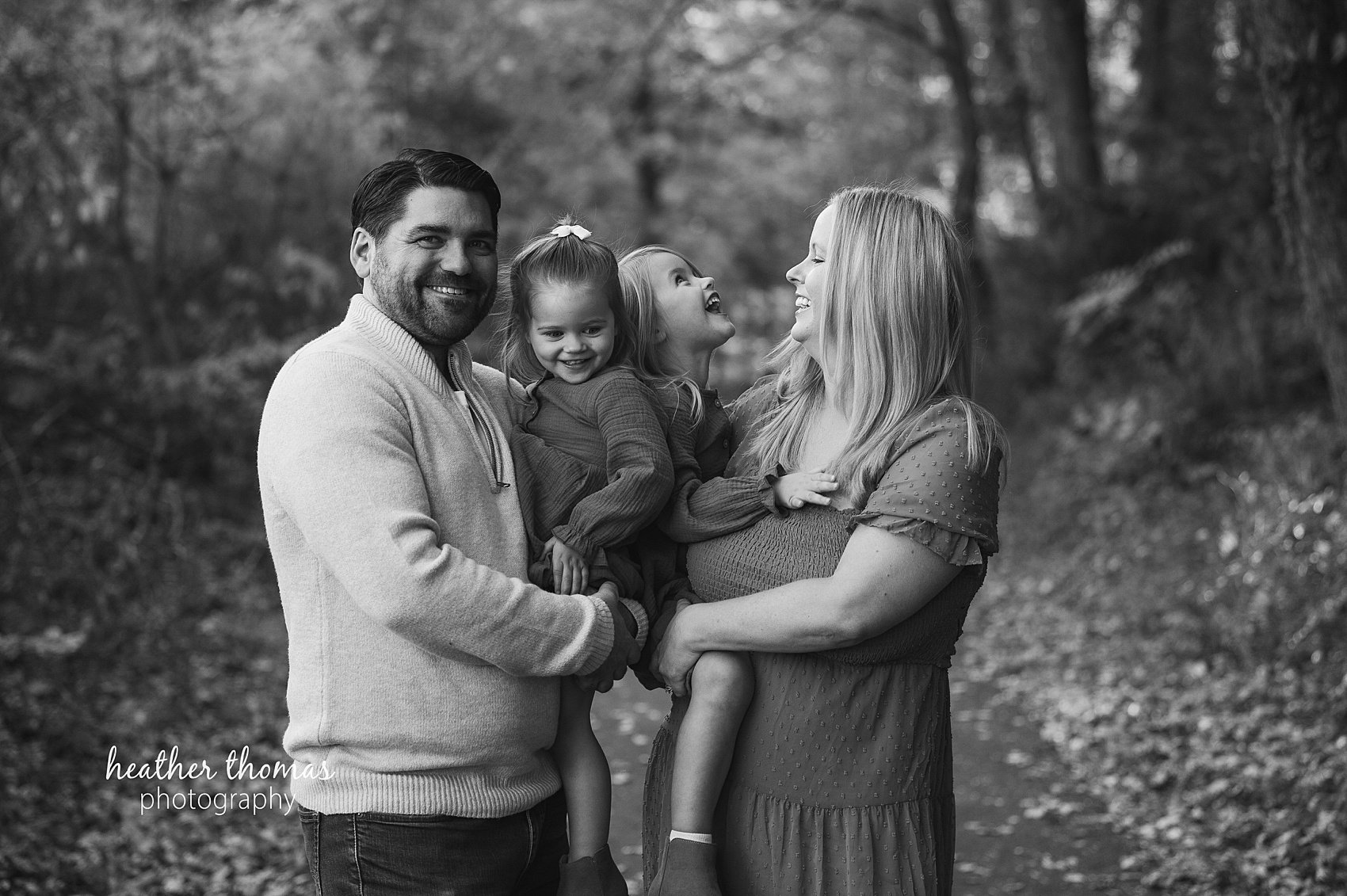 Bucks-County-Family-Photographer-Heather-Thomas-Photography-68.jpg a family laughing at tyler state park bucks county pa