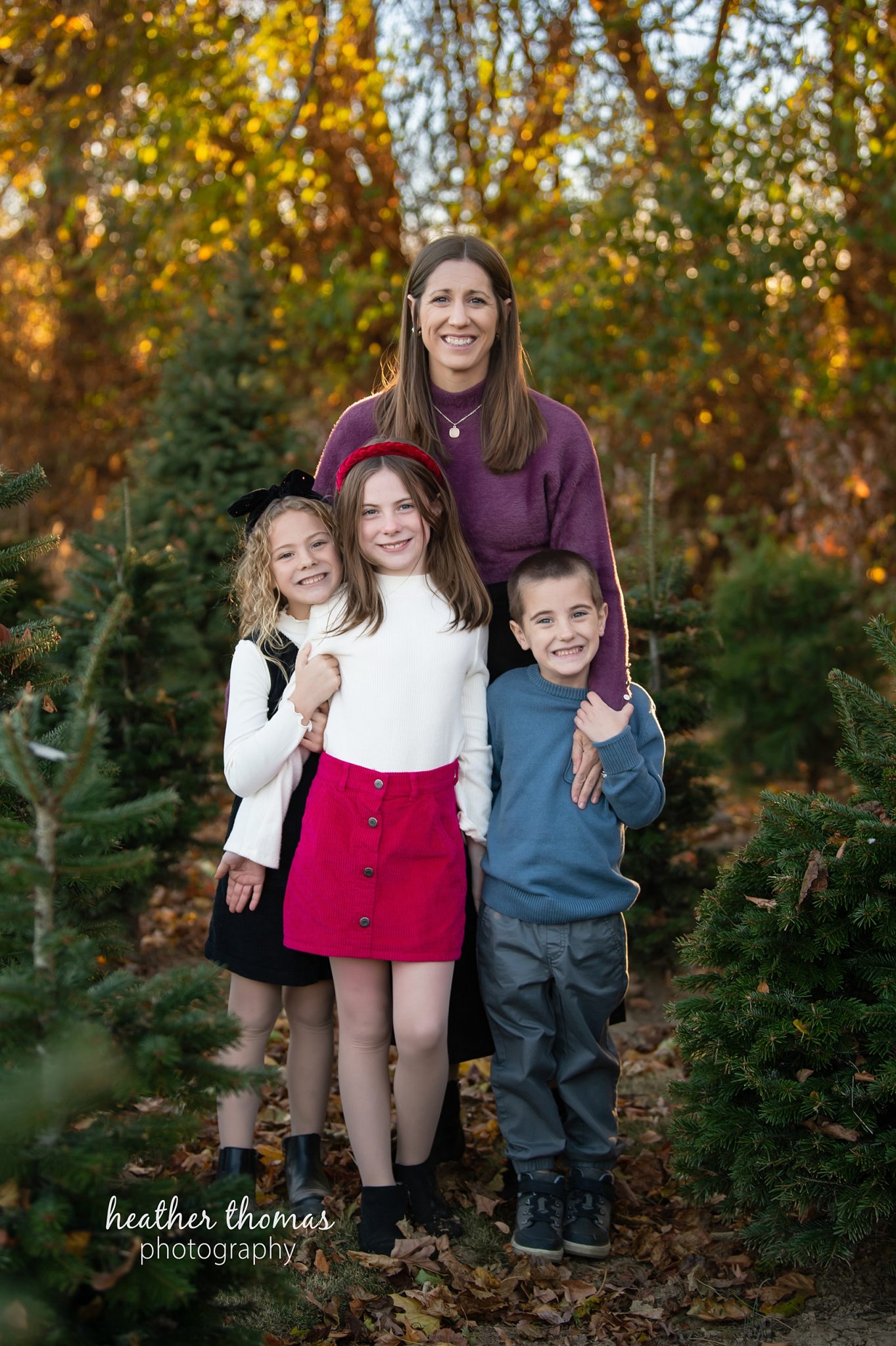 christmas-tree-farm-photo-shoot-heather-thomas-photograhy-82.jpg a mother and her children at the christmas tree farm in bucks county for a professional photo shoot with heather thomas