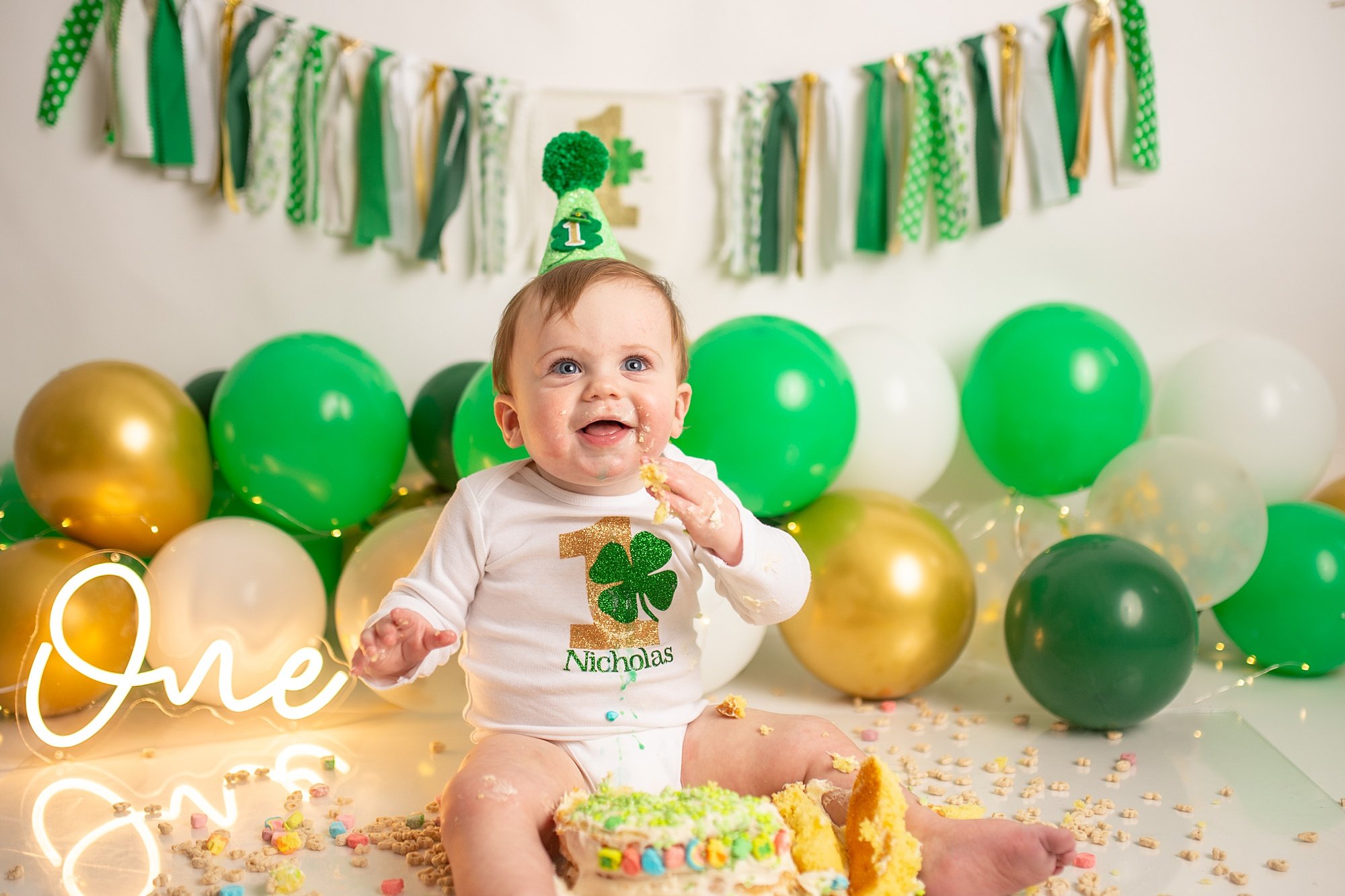 DCS_0914.jpg Philadelphia st patricks day themed Cake Smash Photographer with baby in white and green at a lucky charm cake smash