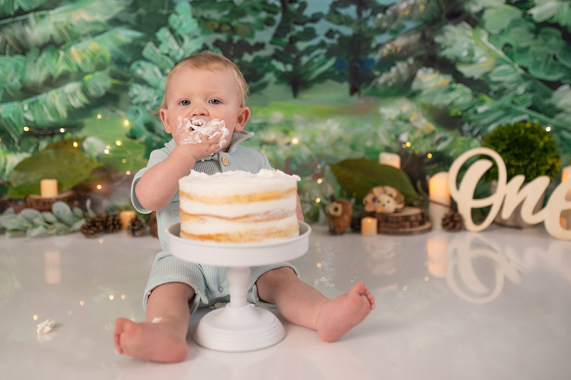 Swope - First Birthday-59.jpg an outdoor themed milestone birthday photoshoot with birthday photographer heather thomas photography