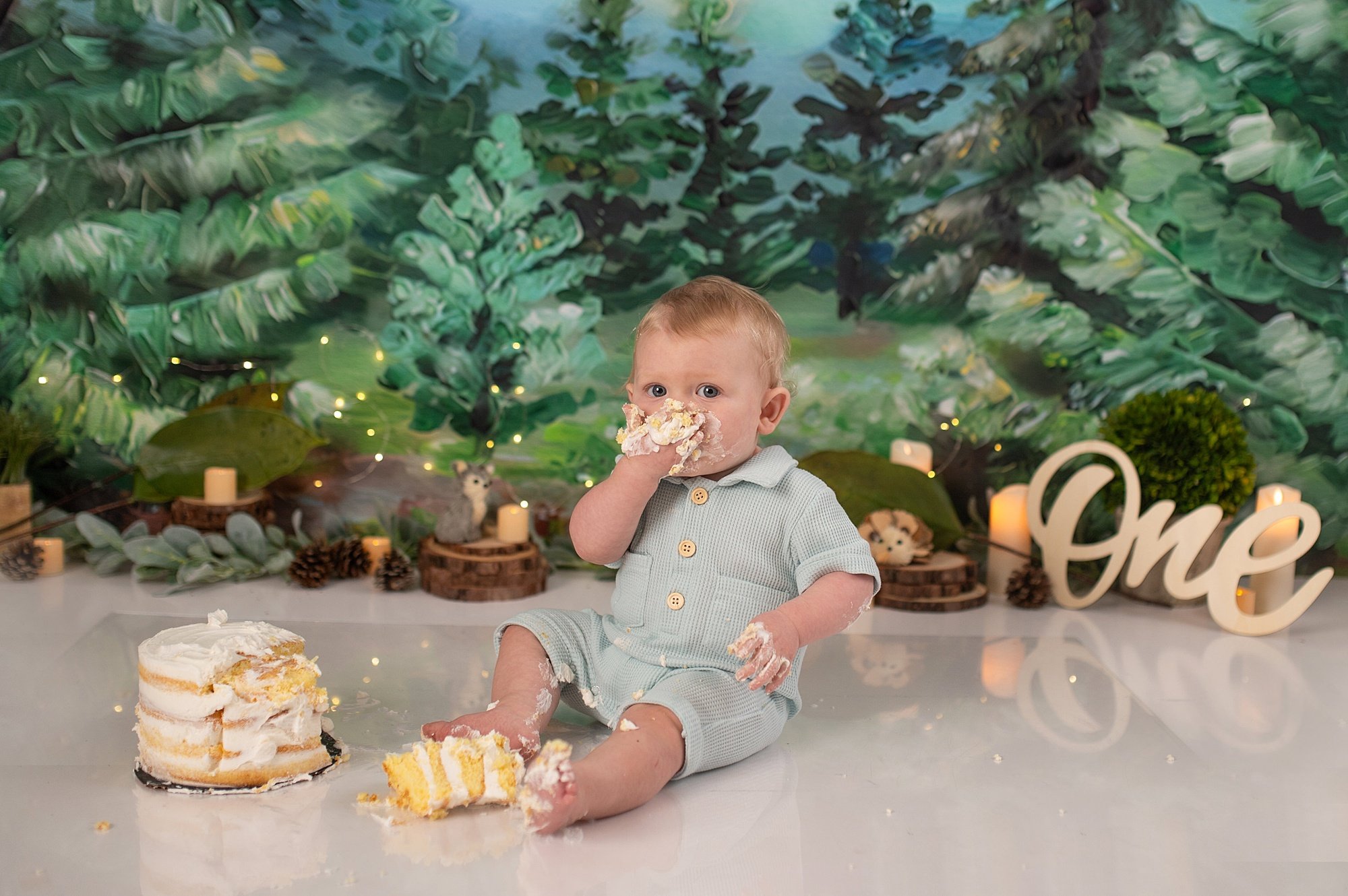 Swope - First Birthday-68.jpg baby enjoying a first birthday cake smash