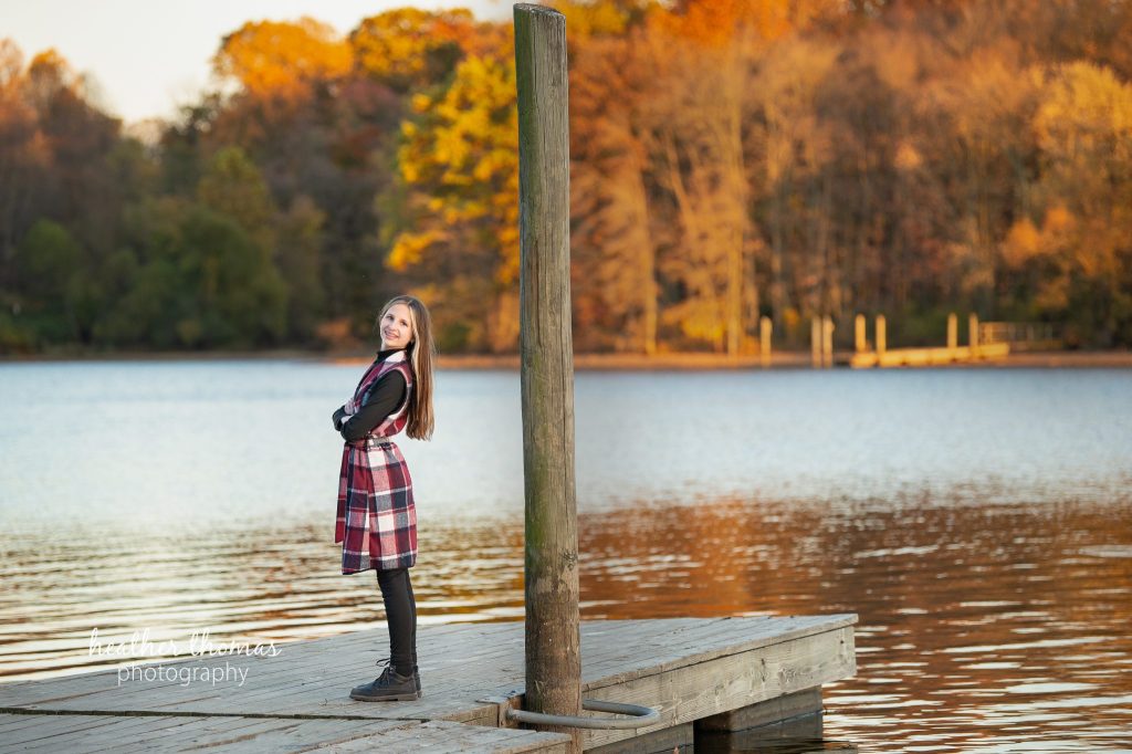 Fall Mini Session Photography in Philadelphia Fall mini Philadelphia photography session featuring girl in plaid vest with brown dog