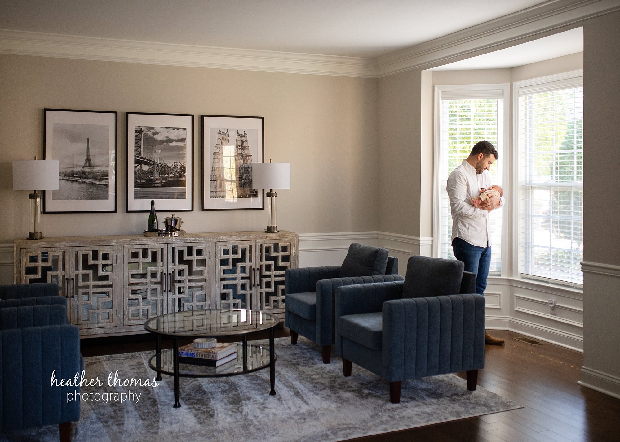 philadelphia-newborn-photogrpaher-heather-thomas-photography--02 a family holding a newborn boy during an in home lifestyle newborn photo session with heather thomas photography