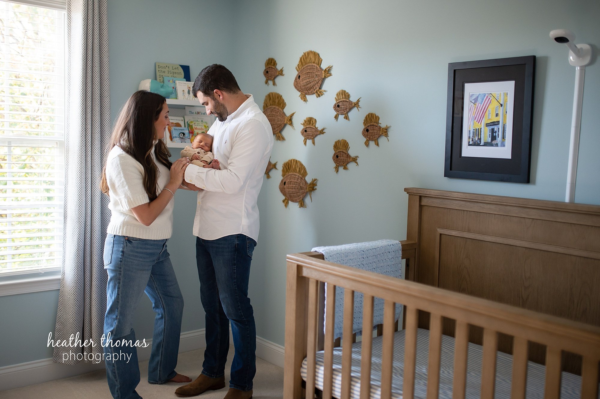 philadelphia-newborn-photogrpaher-heather-thomas-photography--02 a family holding a newborn boy during an in home lifestyle newborn photo session with heather thomas photography