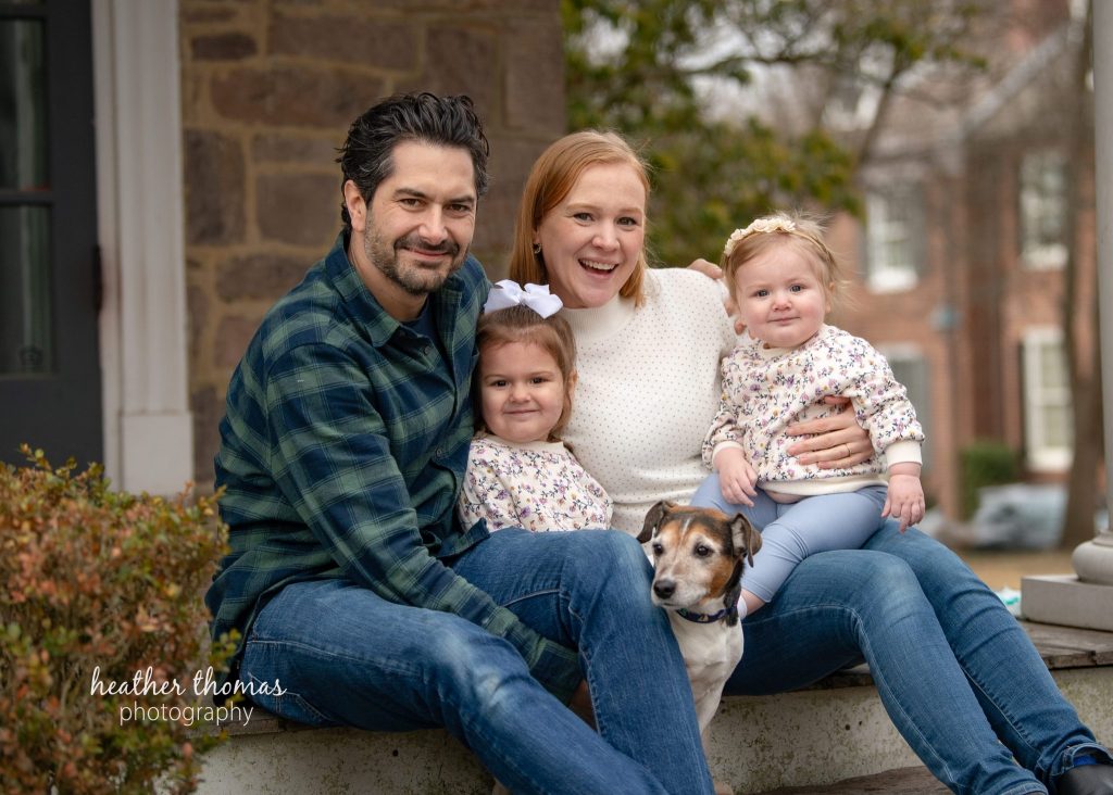 5 Things To#15 Ask Before Your Cake Smash Shoot | Bucks County Family Photographer family of four and their pup sit on step by Heather Thomas Photography