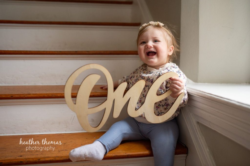 5 Things To#15 Ask Before Your Cake Smash Shoot | Bucks County Family Photographer baby sits on steps after parents learn 5 Things To Ask Before Your Cake Smash Shoot