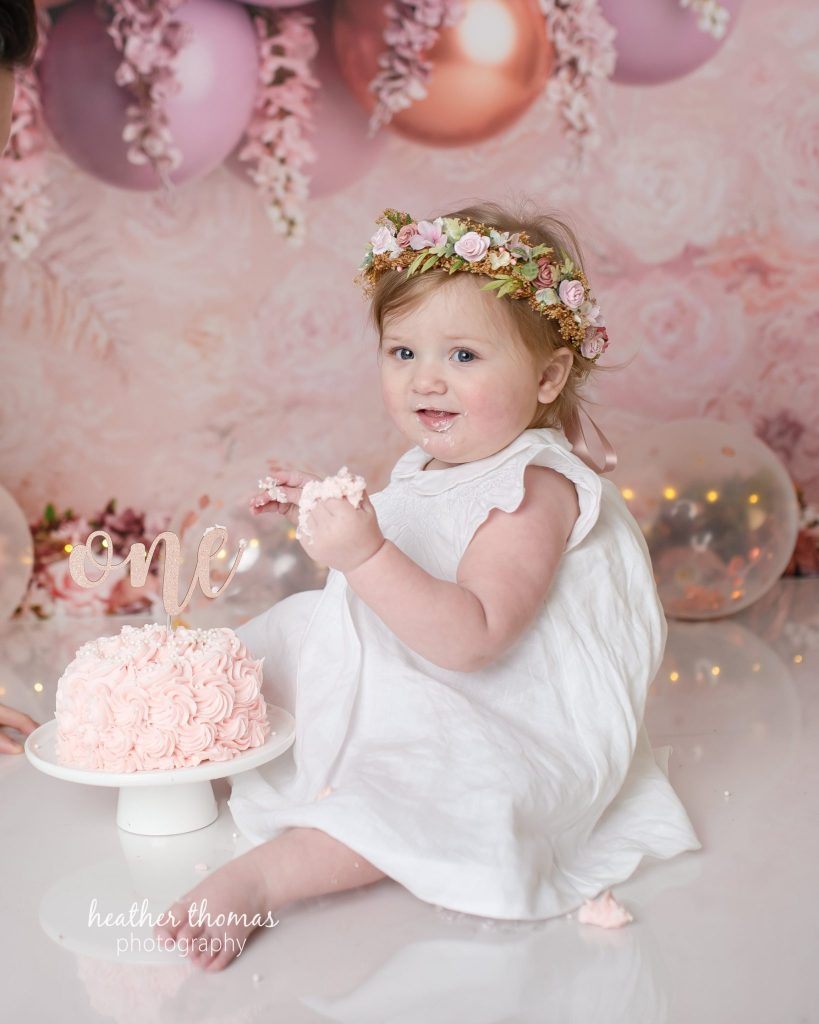 5 Things To#15 Ask Before Your Cake Smash Shoot | Bucks County Family Photographer blonde baby in white dress learns 5 Things To Ask Before Your Cake Smash Shoot