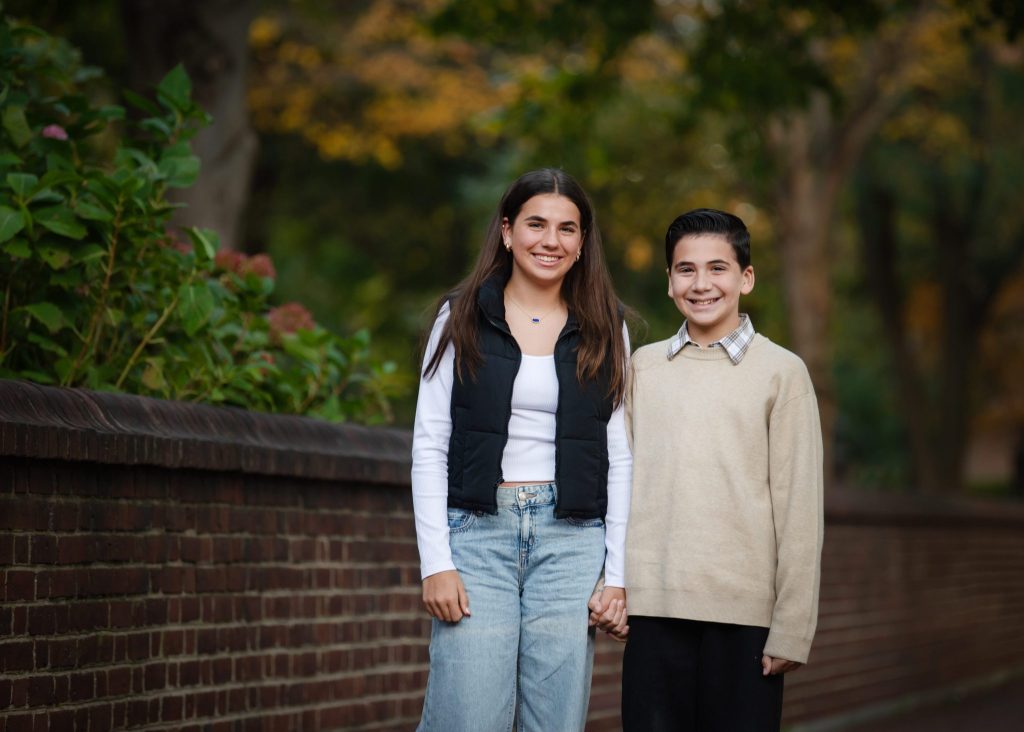 Washington Square Philadelphia Family Photography Session a brother and a sister standing Washington Square Philadelphia at a Family Photography Session