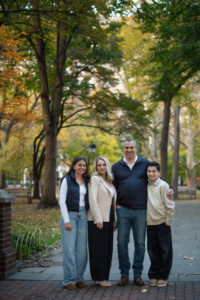 Washington Square Philadelphia Family Photography Session a family of four standing at washington square park at their family photo session