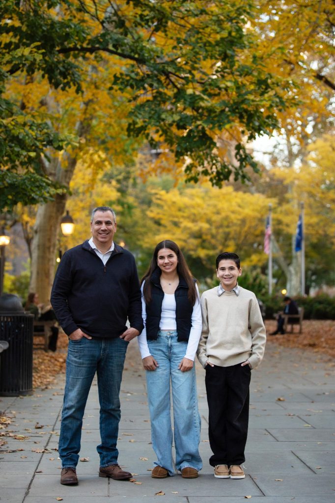 Washington Square Philadelphia Family Photography Session a father and his two children at a family photography session with heather thomas photography at washington square park